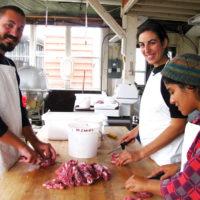 Guests chopping meat