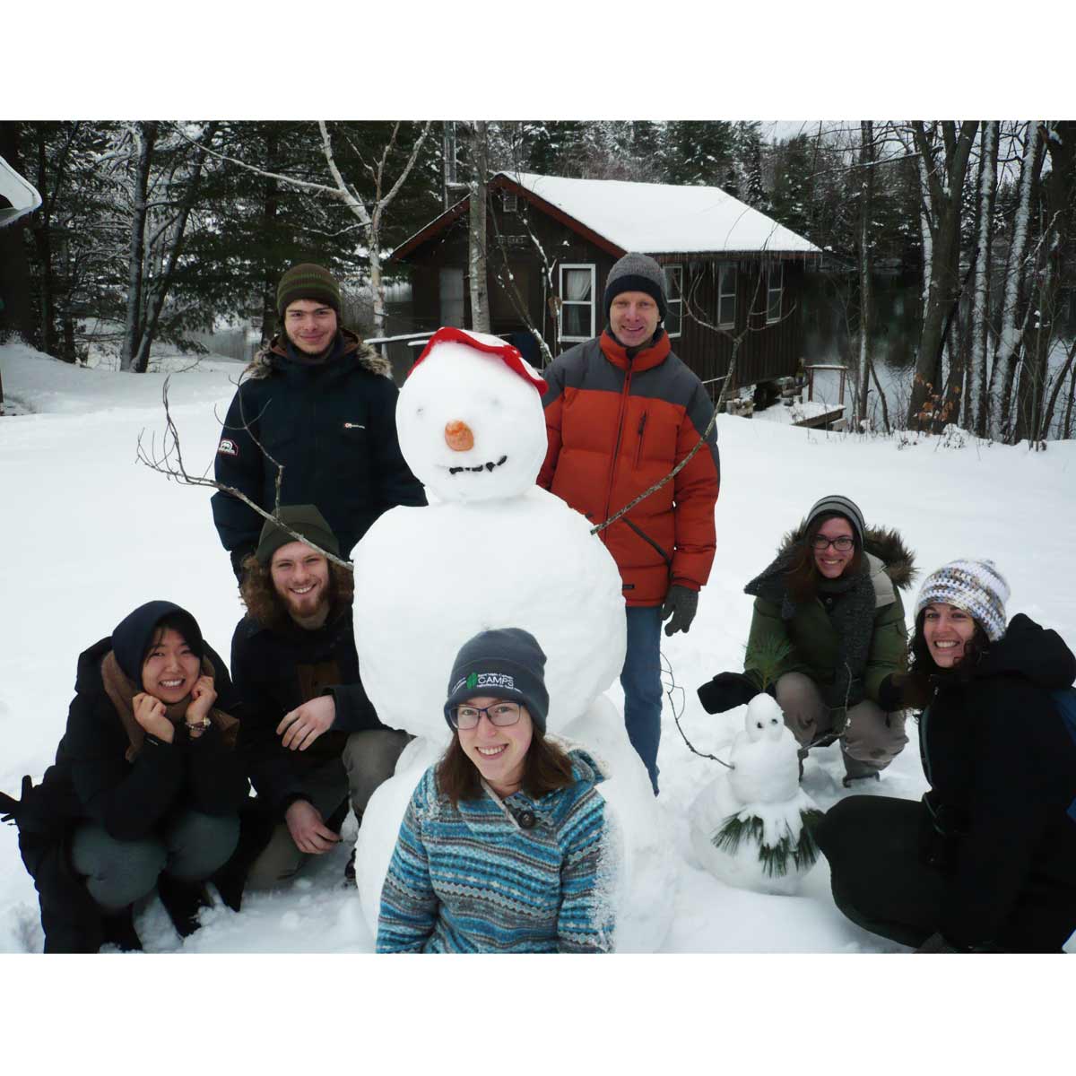 guests and staff built a snowman